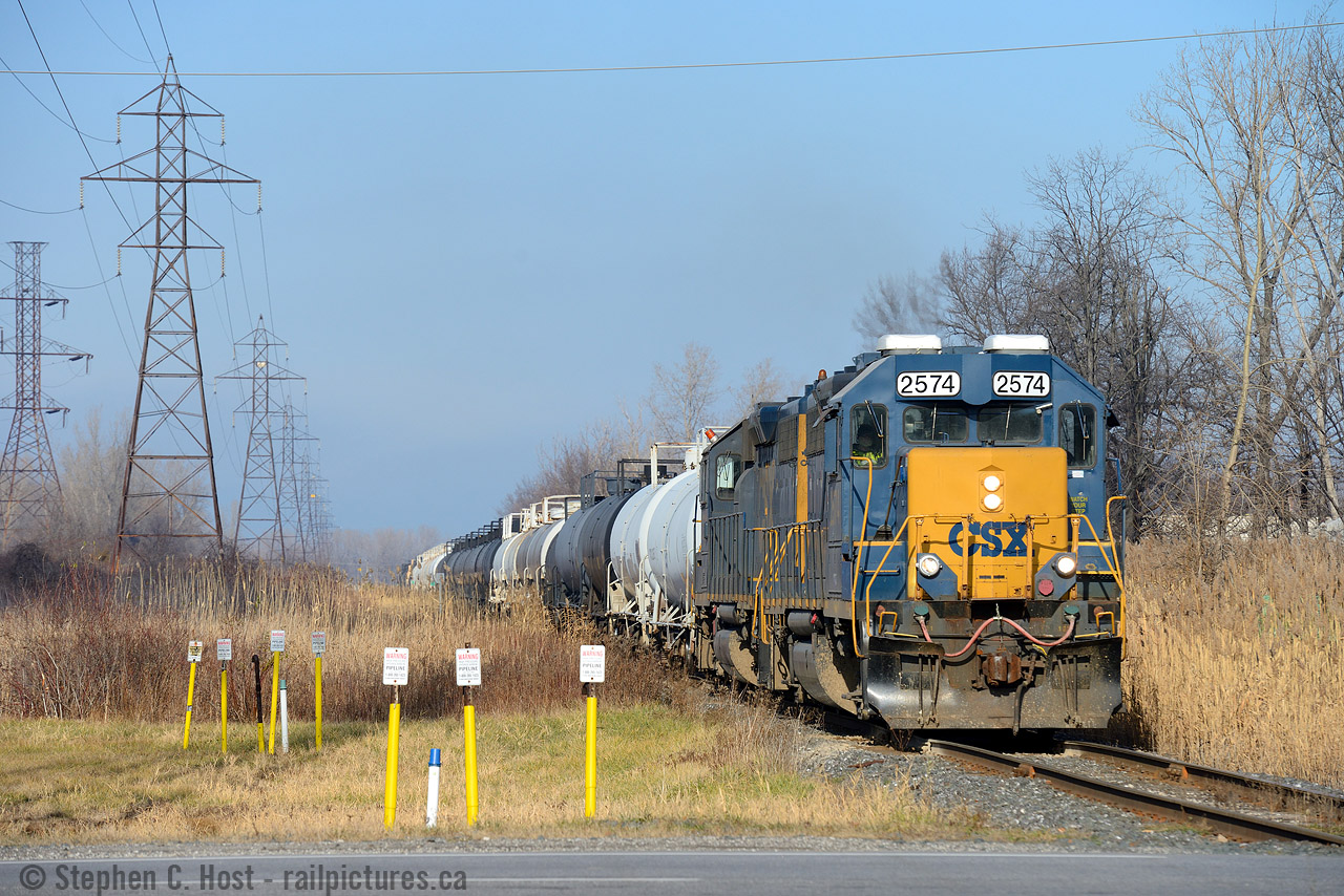 CSXT's Daily transfer from CN is almost at home rails, about to cross Highway 40 in Sarnia. It's nice to see air conditioning on yard units, a rare amenity for railway crews, but it was quite cold on this day despite the lack of snow.