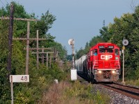 <b>On borrowed time</b> CP T69, the London Pickup job splits the searchlight signals at mile 48 of the Galt Sub with 21 cars from the OSR at Guelph Junction. New signals (out of sight) have began to pop up between Guelph Junction and Galt marking the end of these signals on the OCS/ABS portion of the subdivision.