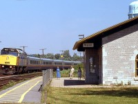 VIA Rail F40PH class unit 6400 and a string of LRC cars make up today's train #43, slowing to make its stop at Napanee Station. This is the only scheduled west bound stop at Napanee.
<br><br>
The old stone station was originally built by CN predecessor Grand Trunk Railway in 1856. It is a classic structure that has changed very little in the 160 odd years since it was built, and is still in use today by VIA Rail.