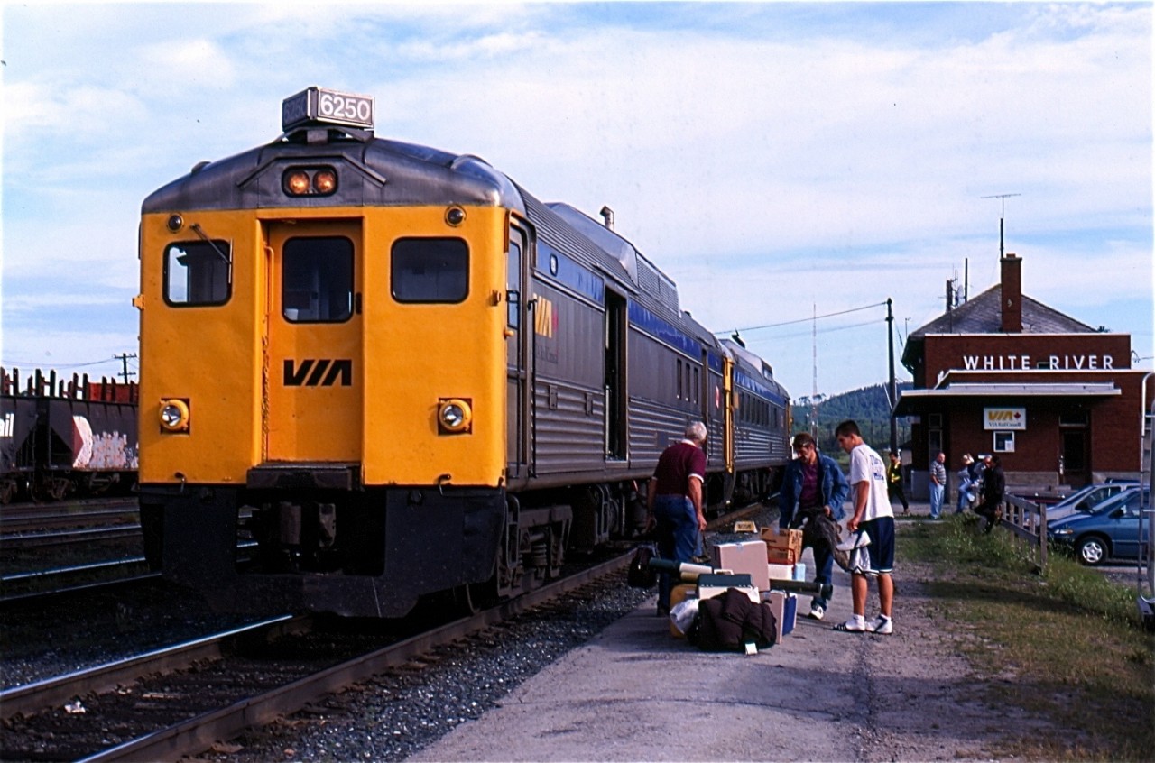 In the morning hours of July 20, 2003 VIA train 186 is busy loading passengers and their belongings as the train prepares to begin its trip south to Sudbury. The RDC Cars on VIA's roster are a dying breed with only this run and the one on Vancouver Island being their last stand. Today this run still operates with a few RDC's since refurbished, sadly the run on Vancouver Island was cancelled a number of years ago due to track maintenance issues.