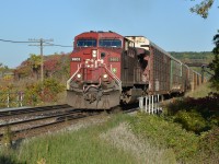 CP 9803, is on a solo mission, charging upgrade and westbound with a long train comprised of autoracks.  Like Kevin Flood, I suspect this was the 1st of two CP 147's less than 30 minutes apart.  Friday was another PD day for me, excellent conditions and opportune time to revisit Campbellville and its classic rail-fanning spot ... escarpment, private wooden bridge, rail type fence, track grade and enhanced by a timely touch of fall colouring.  