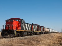 CN 1409,1421 and 1406 are in the process of making a large shove from the industries of Fort Saskatchewan to the yard at Scotford.
