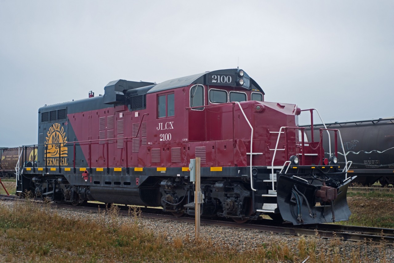 JLCX 2100 is one of the strangest looking GP10 locomotives I've ever seen. It is on lease to the Gardiner Dam Terminal, a large grain elevator just south of Strongfield Saskatchewan.