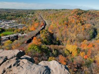 With only 2 out of the 6 units providing the power, Chicago to Montreal Train 148 descends the hill by the beautiful autumn colours.