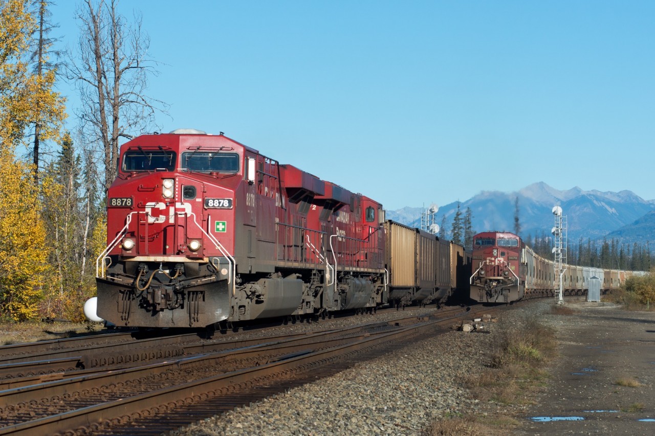 CP 8878 east is rolling through KC Junction at the West end of Golden BC. In a hundred or so feet it will enter the Windermere Sub bound for Crowsnest Pass. The tail end of a westbound potash train can also be seen on the north track of the Mountain Sub.