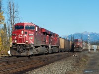 CP 8878 east is rolling through KC Junction at the West end of Golden BC. In a hundred or so feet it will enter the Windermere Sub bound for Crowsnest Pass. The tail end of a westbound potash train can also be seen on the north track of the Mountain Sub. 