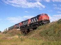 This is my first (and maybe only) encounter with train 212. Imagine my surprise seeing the two BCR Alcos in tow. I cannot read the numbers but they look like C-425's. Any ideas?