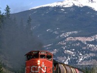 Doing a superb imitation of an Alco, these old EMD's accelerate west out of Jasper.
That's probably Signal Mountain in the background.