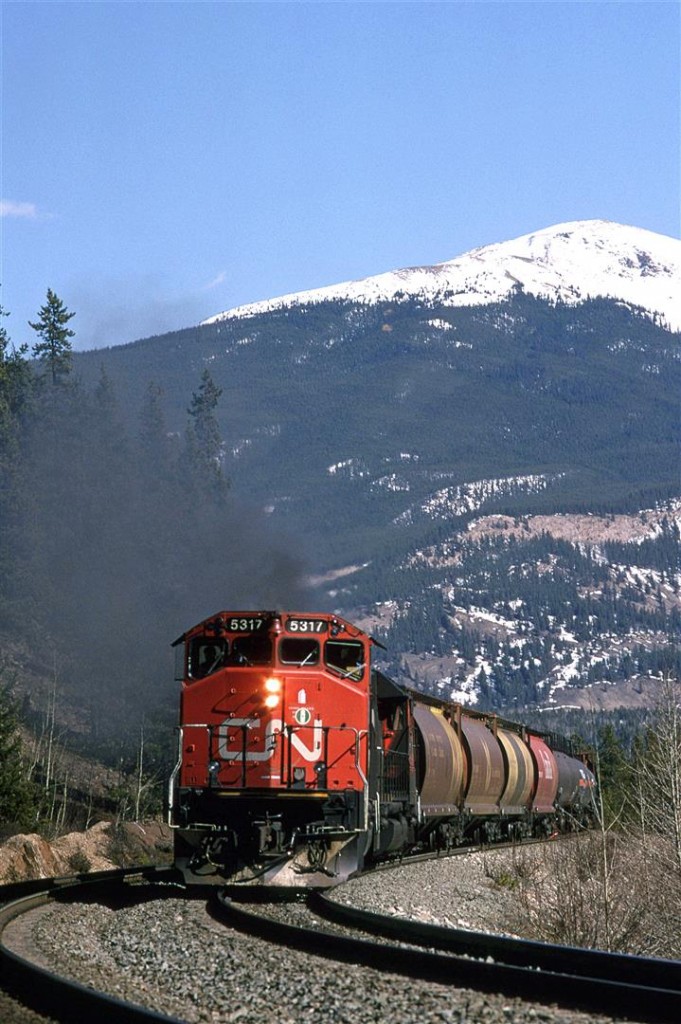 Doing a superb imitation of an Alco, these old EMD's accelerate west out of Jasper.
That's probably Signal Mountain in the background.