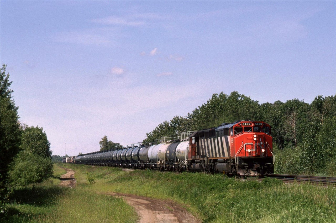 This is what #218 become over the years - lots of tank cars destined for the growing chemical plants and refineries around Edmonton. This was an important train, presumably because it made a ton of money for CN. I think that it would continue east with all new tank cars later in the evening.