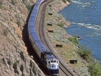This westbound "Rocky Mountaineer" was slowly trailing behind a CN grain' blocks. My guess is that there were no complaints from the passengers.