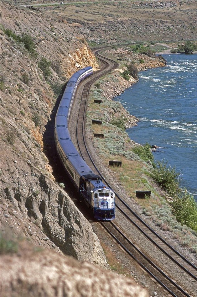 This westbound "Rocky Mountaineer" was slowly trailing behind a CN grain' blocks. My guess is that there were no complaints from the passengers.
