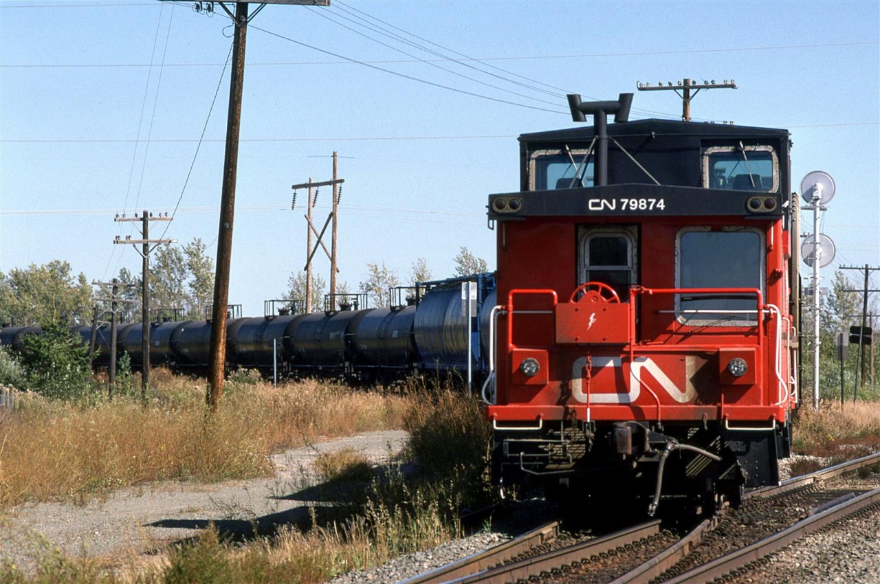 The rear of train #586 to Grand Center (everyone else knows it as Cold Lake), take the switch off the Vegreville Sub to the Coronado Sub. The jet fuel that dominated this usually rather short train made it rather distinctive if seen without any inside information. Of course the fuel was destined for CFB Cold Lake, where CAF and NATO planes practiced on a regular basis.