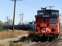 The rear of train #586 to Grand Center (everyone else knows it as Cold Lake), take the switch off the Vegreville Sub to the Coronado Sub. The jet fuel that dominated this usually rather short train made it rather distinctive if seen without any inside information. Of course the fuel was destined for CFB Cold Lake, where CAF and NATO planes practiced on a regular basis. 