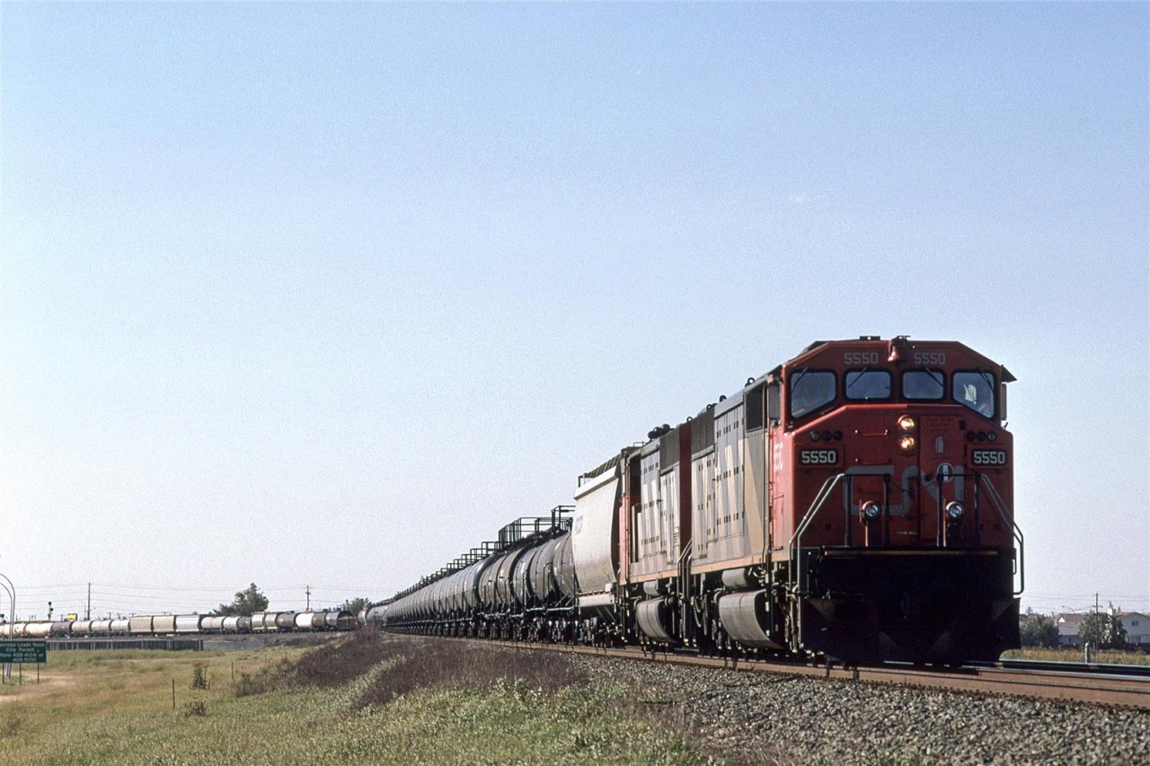 This is what I remember train #218 to be - high revenue chemical traffic, and auto traffic (not visible in this photo), with new high horsepower engines. It wasn't CN's hottest train, but it may have been their most lucrative.
In spite of it being on the east side of Edmonton, and heading east, it is not leaving town. It will conduct business at Clover Bar Yard, which was on the extreme eastern edge of town at the time.