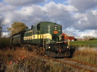 The 2007 York Durham Heritage Railway's Halloween Special passes the Granite Golf Club in Stouffville on a deadhead move to Unionville where it will pick up its load of ghouls and goblins, headed up by venerable RS-3 1310. Out of view on the tail end is RS-11 3612 to pull for the return trip. 