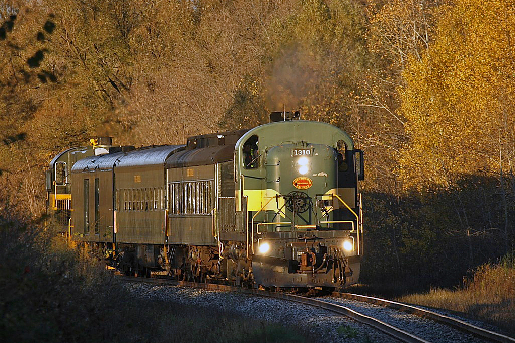 The 2007 York Durham Heritage Railway's Halloween Special deadheads to Unionville, approaching Major Mackenzie Drive headed up by RS-3 1310. RS-11 3612 is on the tail end to pull for the return trip.