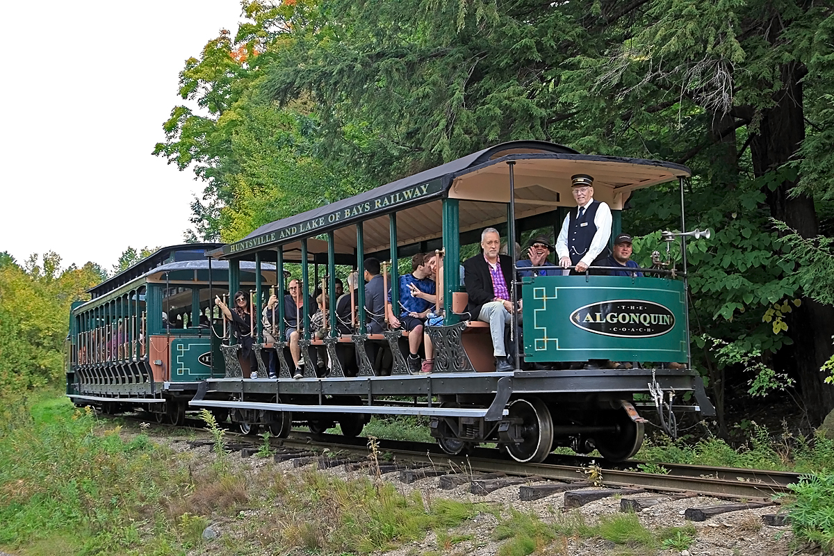 HLBR Conductor Dave Lucas looking sharp on the rear vestibule of the coach "Algonquin".