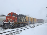 Oh what a difference a day makes! About 24 hours previous I took <a href="http://www.railpictures.ca/?attachment_id=26665"> <b>this shot</b> </a> of 4132 sitting in Huntsville Yard. It doesn't appear to have turned a wheel since and all the same cars are in the same places, it's just all those white glops falling from the sky that makes it different!