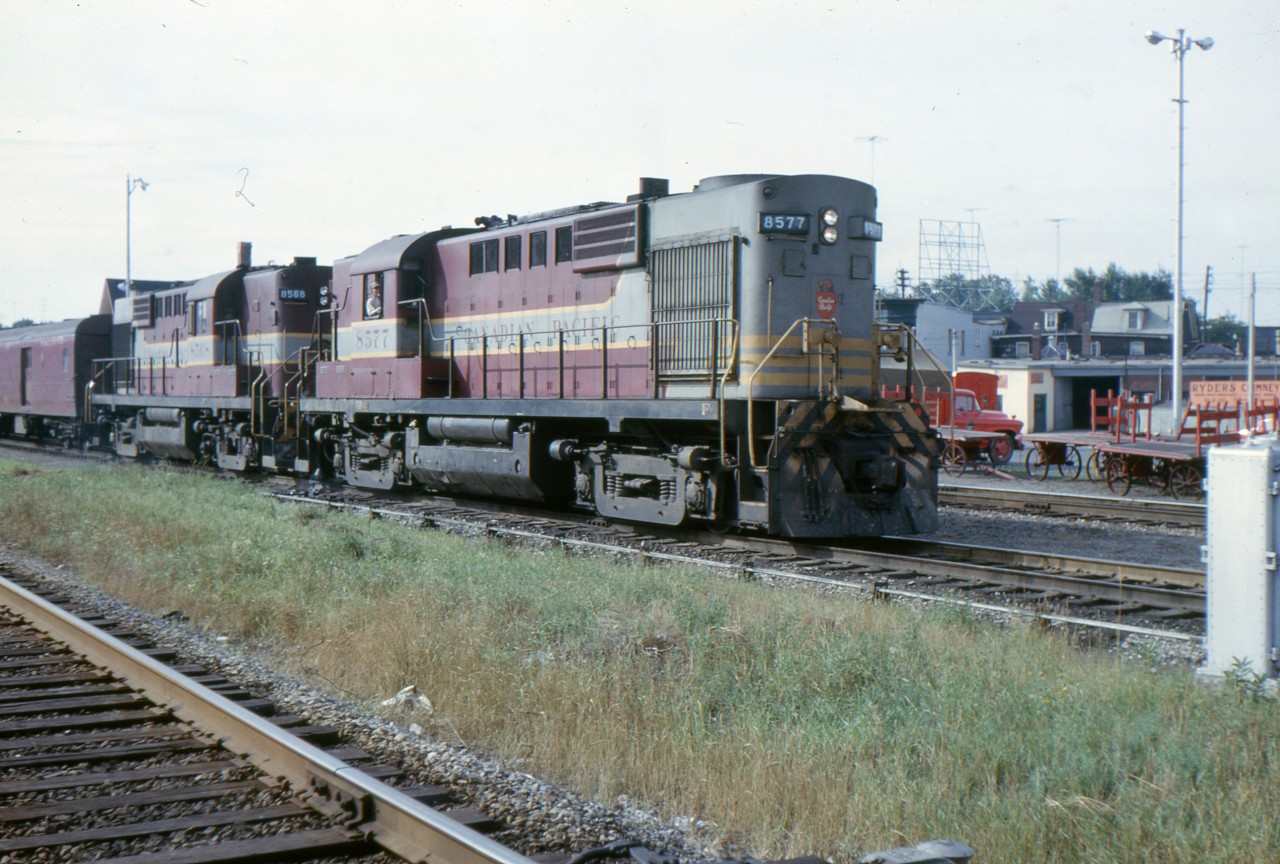 A pair of dual service RS-10s are about to depart West Toronto for Windsor with a 7 car No 21 on August 19, 1963. In less than a year this train will be discontinued in favour of RDCs. 21 continued to operate from Montreal to Toronto as a standard train for a few more years.