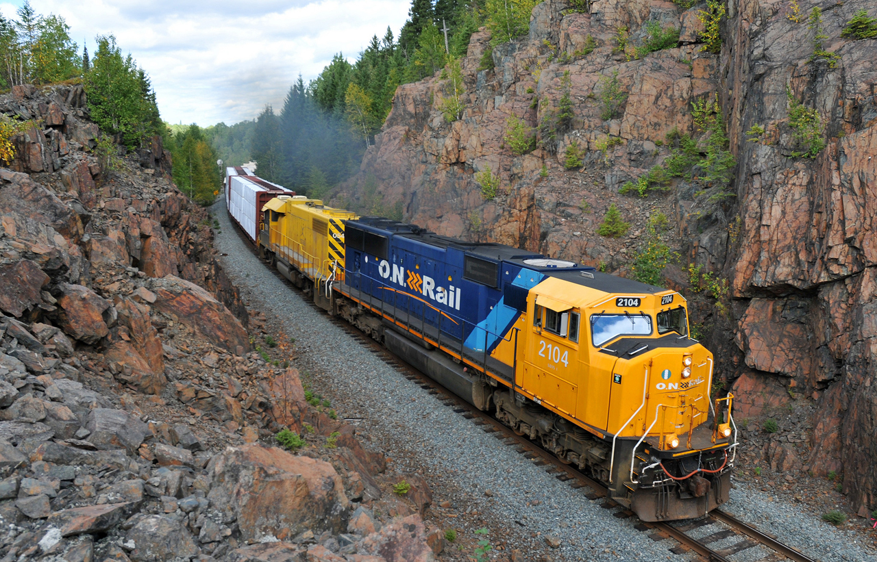 308 from Kidd passing through Boston Creek with ONT 2104 - XSTR 054 and 20 cars