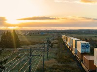 With the sun peeking through, CN 120 heads into the sun, towards the town of Amherst, Nova Scotia. Seen here, at Fort Lawrence, shortly after crossing the New Brunswick/Nova Scotia border, which can be found behind me. 