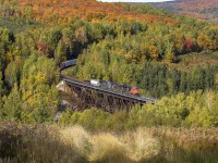On a beautiful Fall afternoon, CN 2344 negotiates the grades and turns of the Pelletier Sub. Seen here, coming out of the trees to cross the trestle at Saint-Eleuthere, PQ. October 1,2016. 