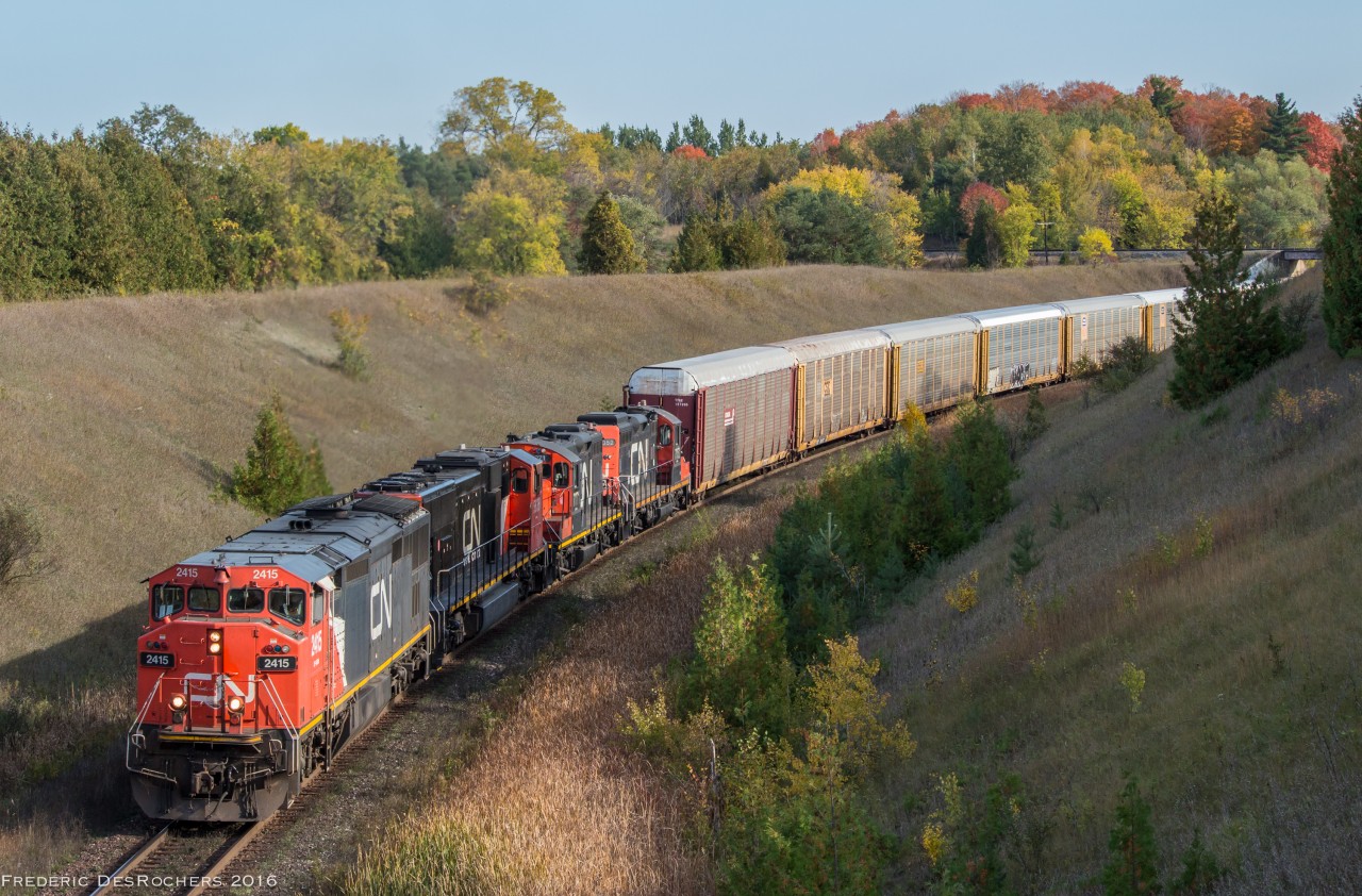 After dealing with some air and SBU problems down at Pickering Jct, 570 is finally on the move crawling up the York Sub through Beare, bound for Mac yard.  


CN 2415, CN 5636, CN 7071, CN 7052