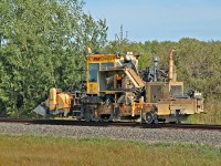 [Note: There are fans of this on the site! Looking at you Paul O'Shell!] Nordco model M42-14 Ballast Regulator/Snow Fighter is seen, minus snow blades, travelling east between Uncas and Lindbrook. 