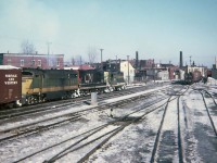 CNR GMD GP9 No.4495, CLC H16-44 No.2214 and CLC CFA16-4 No.9328  March 17, 1965.