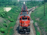   Southbound CN freight leaving Bathurst for Moncton with GMD SD40 5082 and GP40-2L 9422.