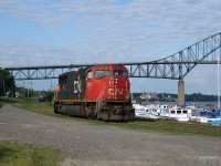 CN SD70I 5615 switching cars on the Loggieville spur mile 8.35 near Chatham's Centennial Bridge along the Miramichi River, July 27, 2012