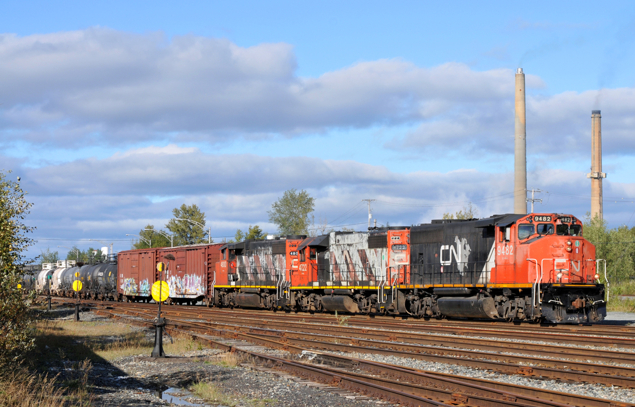 CN L56721 14 making an (apparently) rare daylight departure from Rouyn-Noranda with CN 9482, CN 4722, and CN 4800