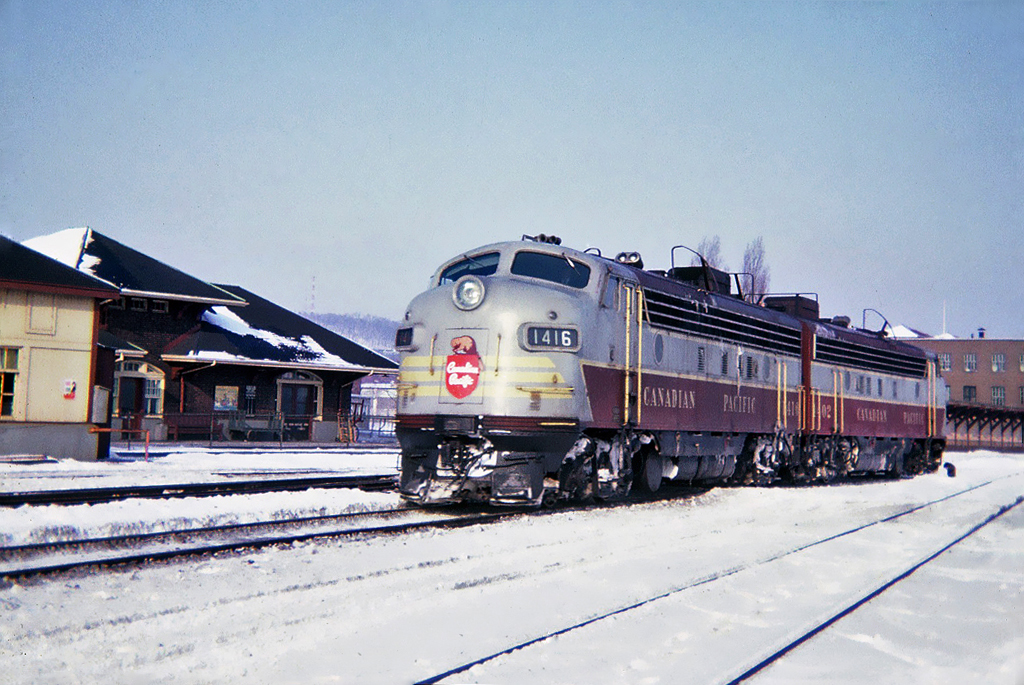 Canadian Pacific GMD FP7(A) No.1416 and 1402 at CP's Westmount Station on the service track to Glen yard. Montreal, Quebec Feb.05, 1965.
