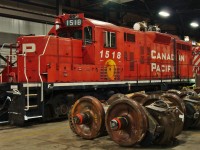 Originally high hood GP9 #8539, GP9u 1518 is in plant #2 having a traction motor change out. It was mated to slug 1025 and was retired in 2014.