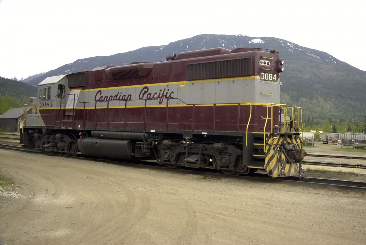 CP 3084, GM GP38 sits silent outside the shop in Revelstoke, BC waiting for its next assignment.