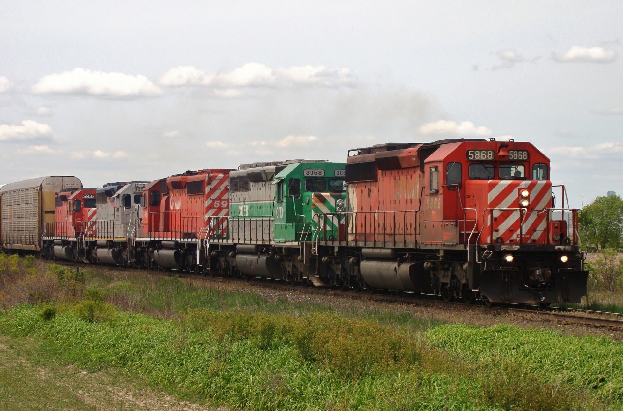 CP 422 is seen here heading out of Windsor at Banwell Rd. bound for Toronto behind five SD40-2's (the third unit is CITX 3072 the former Alstom demo unit). At the time there were two trains a day out of Windsor Yard for Toronto and latchups like this on 422/423 were common.