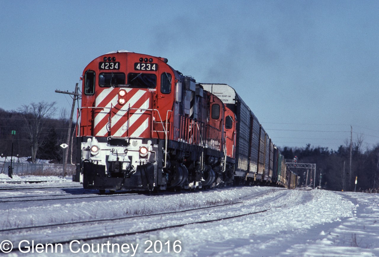 Train #923 ran to Windsor, mostly autoracks. On this day I waited a long time at Guelph Jct. for him to appear. When radioed the RTC and reported that he was down to 4 mph going by the ski hill at Kelso but he made up the hill!