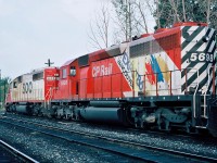  Westbound CP train with in the lead Soo Line SD40-2 6608 with CP Rail SD40-2 5698 Expo86/Vancouver unit.