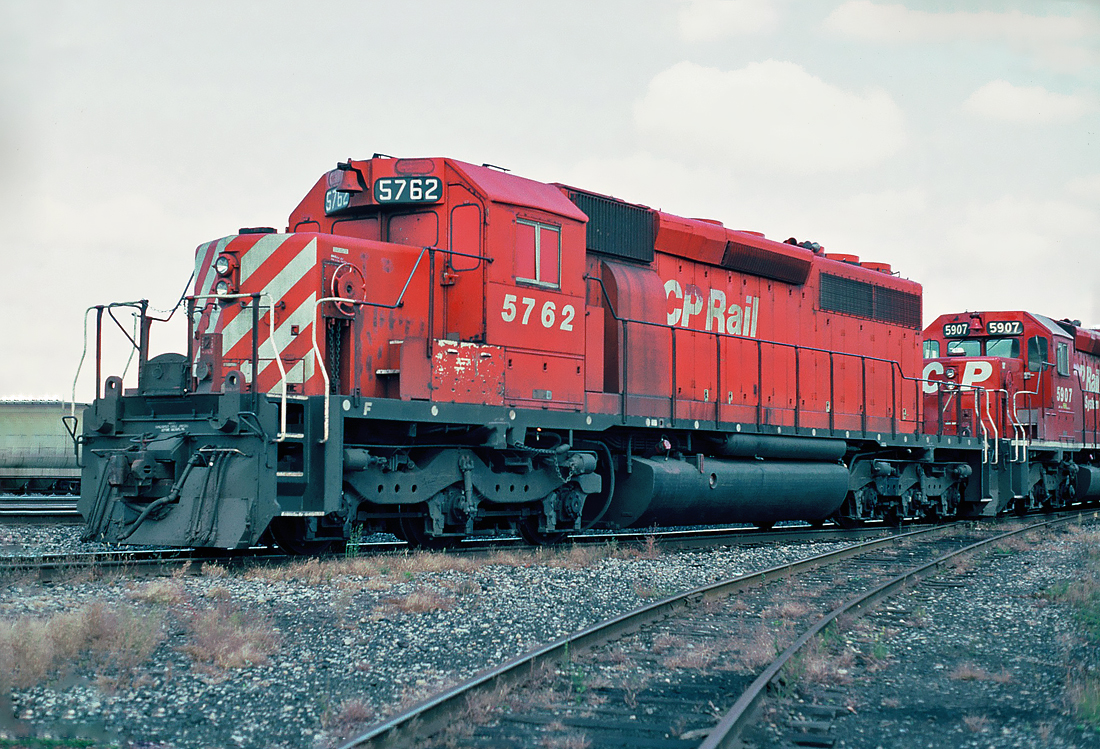 CP Rail GMD SD40-2 5762. In the 90s CP Rail equipped units 5702-5715, 5758-5772 and 6055-6080 with Locotrol-II receiving equipment and ran them as "B" units. Most cabs have been stripped of most appurtenances and windows blanked over; several units in these groups were returned to leader status.