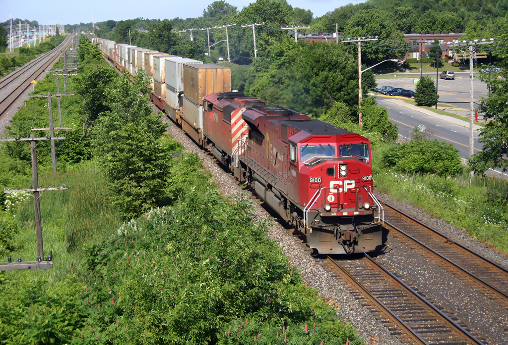 Eastbound Canadian Pacific GMD SD90MAC No.9100 and SD40-2F No.9016