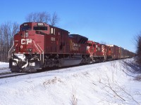 I'm not usually one to say "never", but I think is a consist one will likely never see again. On a cold but clear February 2004 day a combination 427/Ham-Turn passes through Guelph JCT with SD90MAC-H 9303 and GP9u's 8201, 8219. 