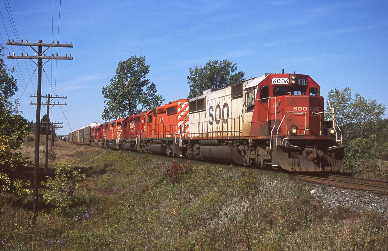 CP#428 is seen just west of Woodstock with a nice mix of EMD/GMD units including CP 5398 and 6607.