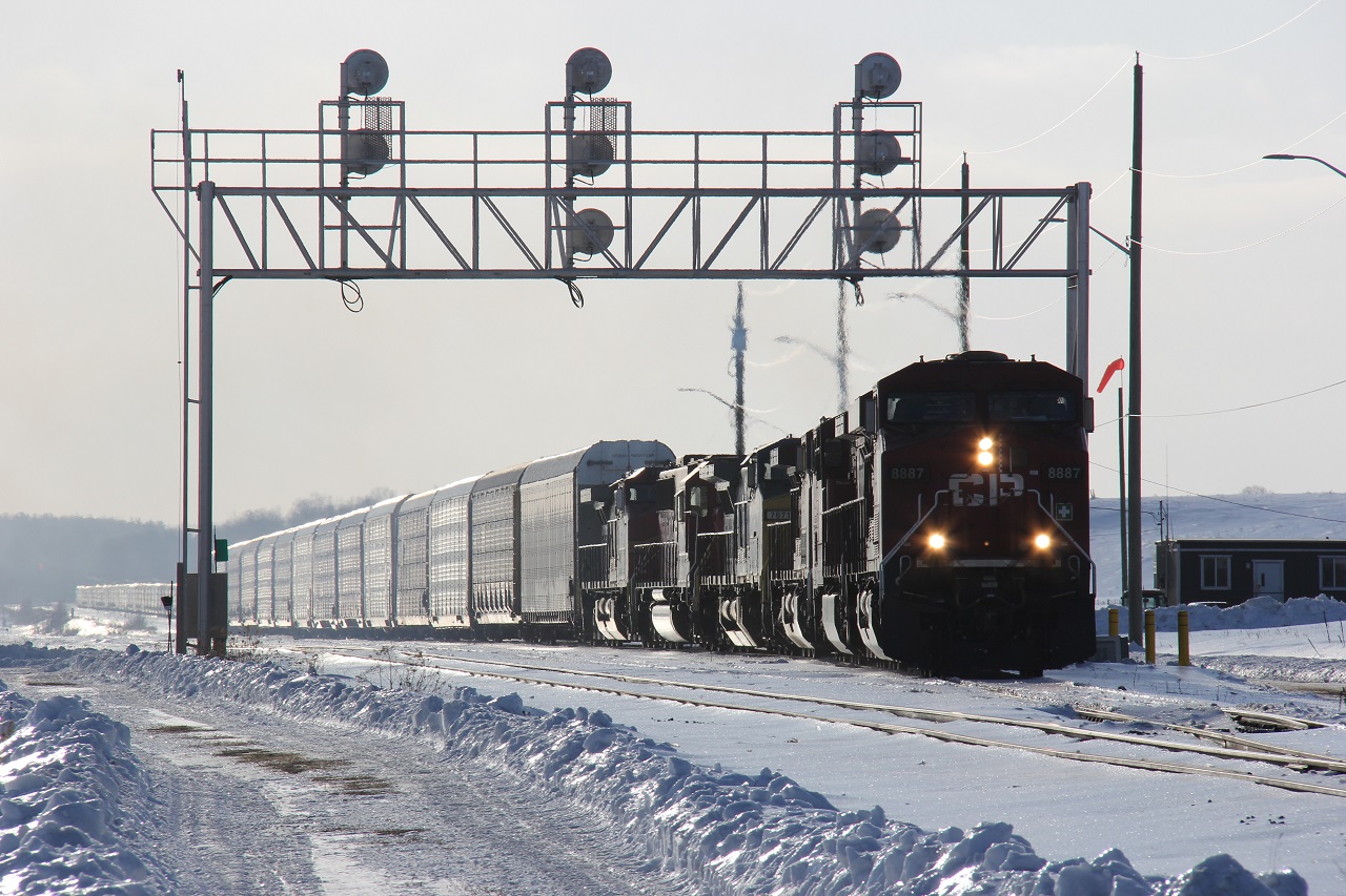 During the winter of 2015, CP was pretty busy and there was lots of colour in terms power. Battered by harsh winter conditions, this CP eastbound slowly departs Wolverton with a lot of power - 6 locomotives, including a CSX locomotive and BNSF 785 in warbonnet paint at the end of the pack.
