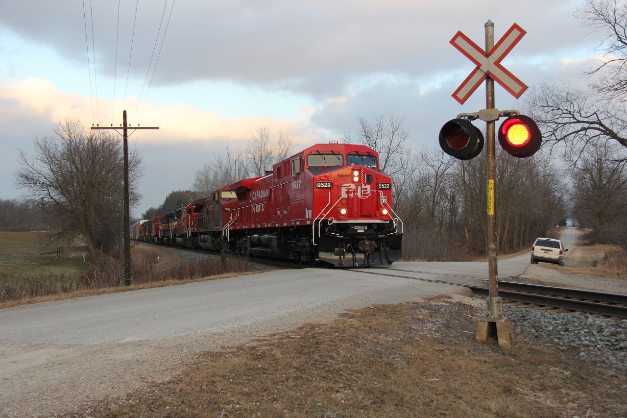 The last day of 2014 was dark, gloomy, raw and snowless - almost like the opposite of a tropical paradise beach scene. CP 147 thunders out of CTC Wolverton with a abundance of locomotives including some U.S. power. Around this time, CP was repainting some of their first GEs (the 9500 series), as evidence, the lead locomotive, CP 9522. The clouds were slowly breaking up to reveal the end of the day, and the end of the year. After spending most of 2014 in China, this scene was very lonely compared to the hustle and bustle on the other side of the world.