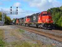 CN A422 glides past the Georgetown Station with SD60 that doesn't seem to want to leave Southern Ontario
