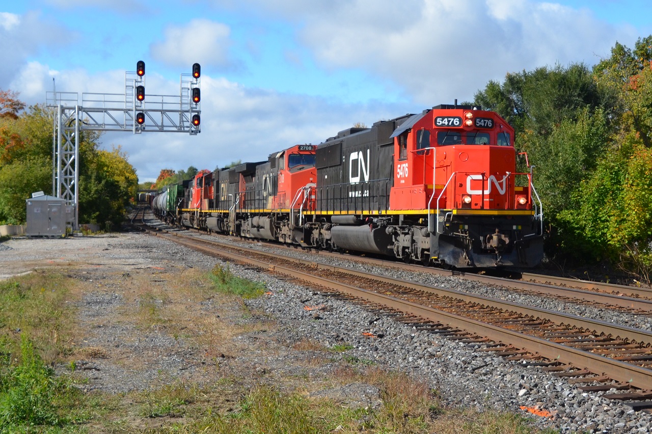 CN A422 glides past the Georgetown Station with SD60 that doesn't seem to want to leave Southern Ontario