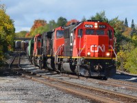 Only your "standard" shot as CN A422 glides through Georgetown with Q148 hot on its block