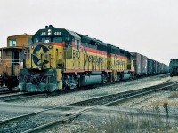  Chessie System (B&O) EMD GP40-2 No.4118 with (C&O) EMD GP40 No.4065 and a CP Rail caboose 434058 at Niagara Falls, Ontario CP Rail yard October 22, 1987.