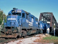 Conrail EMD GP38 No.7936 crossing the Niagara River on the International Bridge from Buffalo, New York to Fort Erie, Ontario  October 26, 1987.